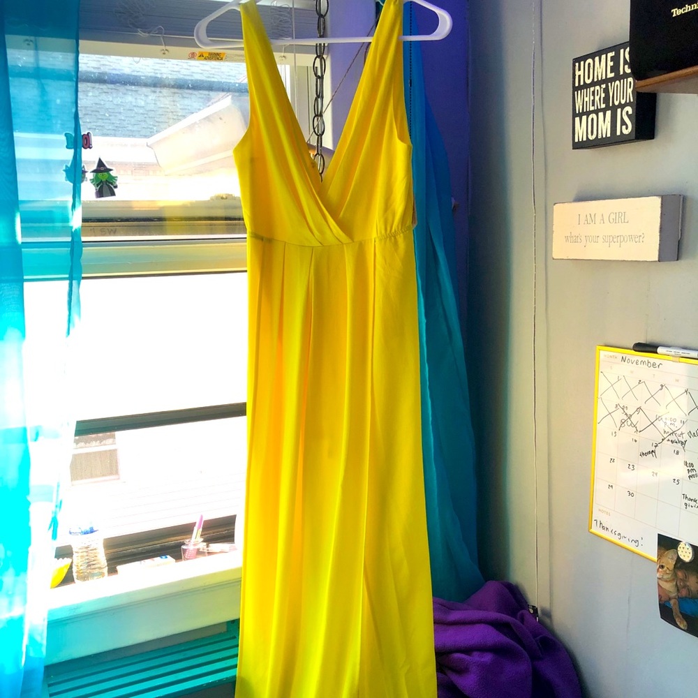 Yellow long flowy dress. Brand new. Never worn.